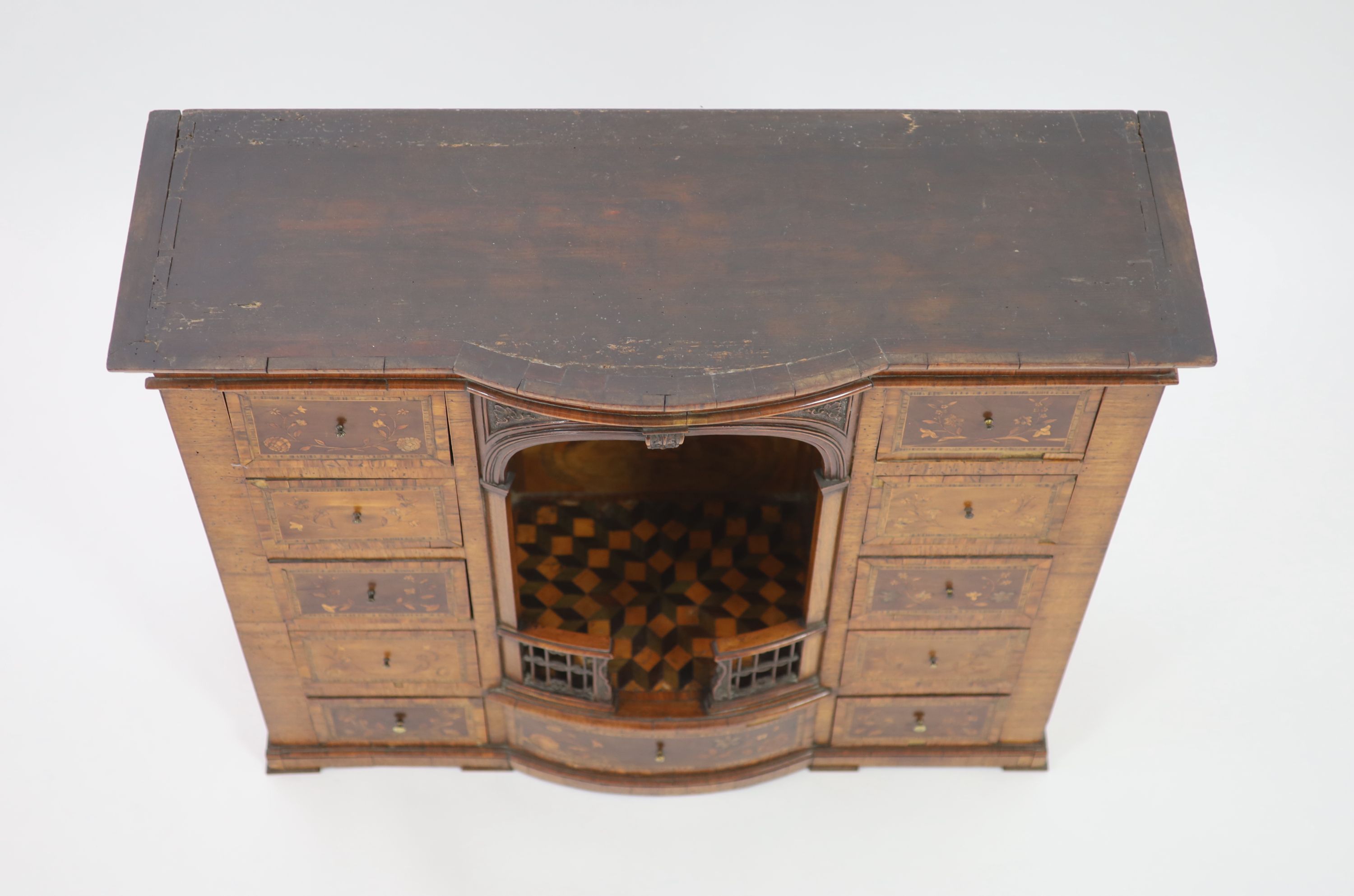 A late 18th century Dutch walnut and marquetry collectors cabinet W 88cm. D 32cm. H 77cm.